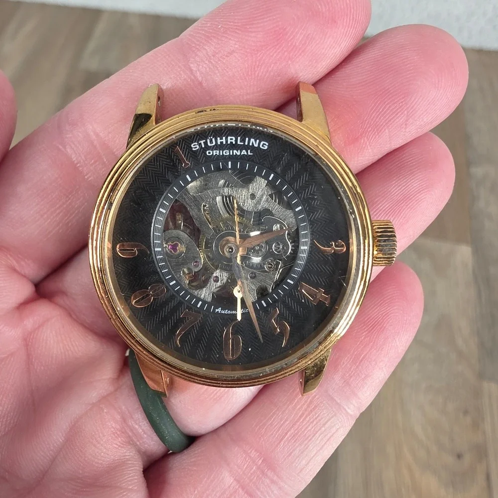 Stuhrling Original Mens Skeleton Automatic Watch Gold Tone ST-90050 Black Dial